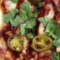 Bbq Pizza · Garlic infused olive oil, fresh cilantro, four cheese blend, tangy BBQ sauce, smoked gouda, ...