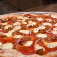 Carne Amante Pizza · Tomato sauce, smoked pepperoni, fresh mozzarella, classic pepperoni, Italian sausage, red on...