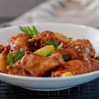 Spicy Wings · Buffalo Sauce, Shaved Carrots & Celery, Cowboy Ranch