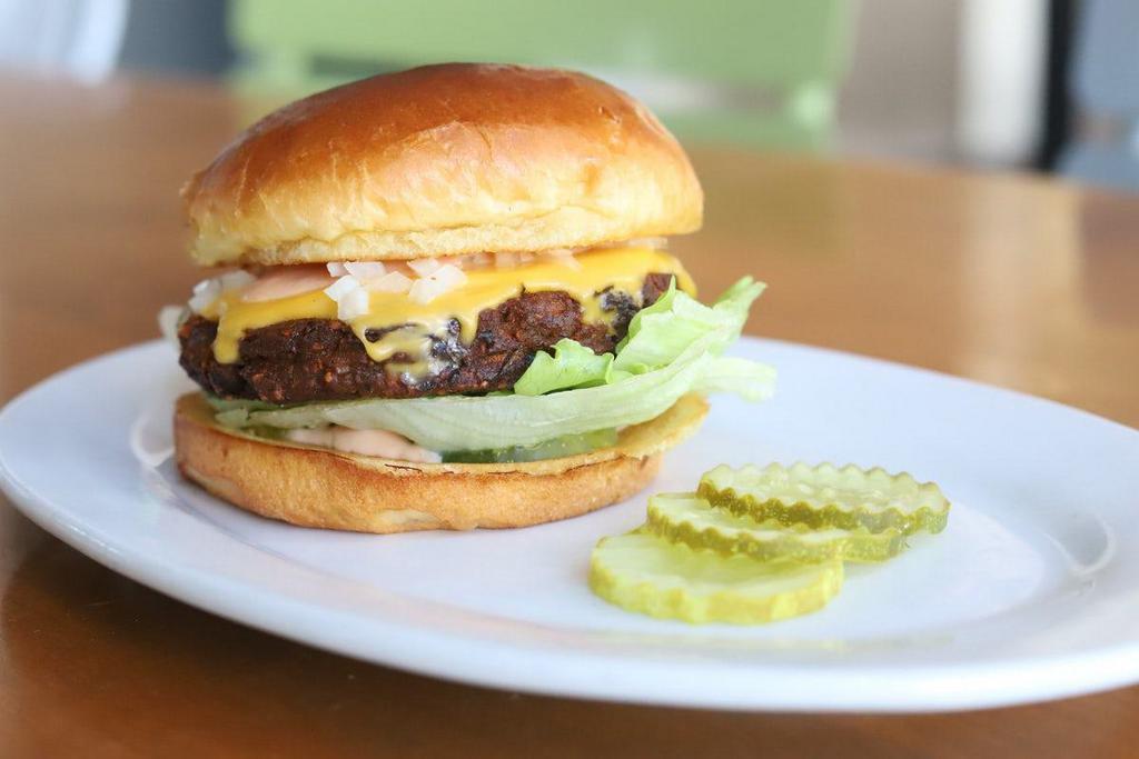 All American Veggie Burger · Crispy House Made Patty, American Cheese, Lettuce, Pickles, Onions & 1000 Island