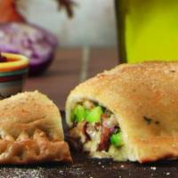 Vegetarian Calzone · (310-1240 cal). Mushrooms, olives, green peppers & onions.