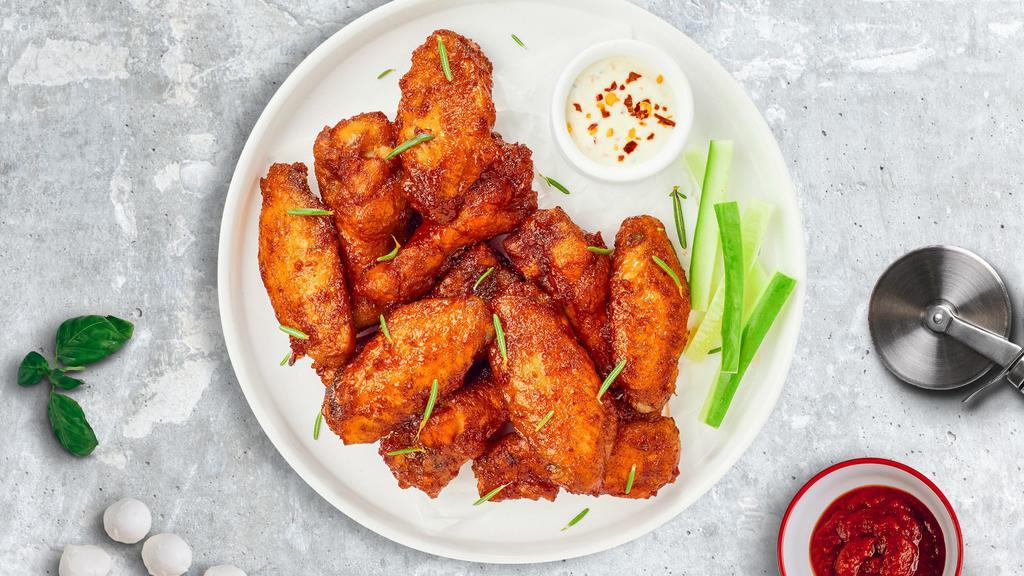 Naked Crunch Wings · Fresh chicken wings breaded and fried until golden brown.