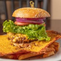 Cheddar-Halo-Cheeseburger · Half a pound of ground sirloin surrounded by a caramelized cheddar cracker with lettuce, tom...