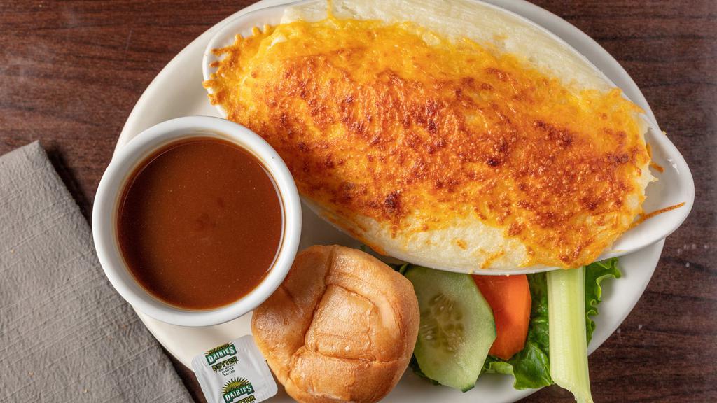 Shepherd'S Pie · Our specially seasoned and marinated ground beef with a heaped topping of home-made mashed potatoes. Served with gravy on the side. Add cheese $1