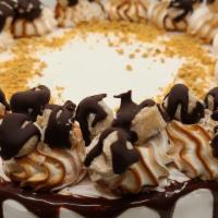 Cookie Dough Froyo Cake · Cake Base: Chocolate Cake
Top Froyo Layer:  Chocolate Froyo
Topping Filling: White Chocolate...
