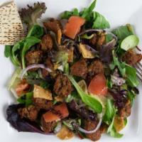 Falafel Salad · Lettuce, tomato, baby arugula, spinach,onions, pita crackers and falafel balls topped with t...
