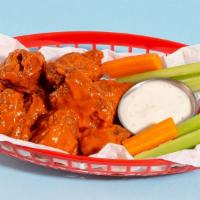 Fried Boneless Wings · (6) Boneless wings drenched in your choice of  sauce, served with celery, carrots, and blue ...
