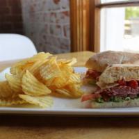 Sopressata Sandwich  · Thinly-sliced sweet sopressata, vine ripe tomatoes, mixed field greens, roasted red peppers ...