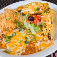 Lunch C · Two Beef or Chicken Tacos served w/ Rice & Beans
