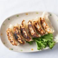 Gyoza · Pork, ginger, cabbage dumplings - 6 pieces