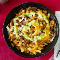 Carne Asada Fries · Top seller Fries topped with choice of meat, onion, cilantro, guacamole, sour cream, chipotl...