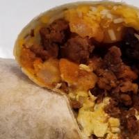 Breakfast Burrito · 3 eggs, ham, sausage, hash brown, sour cream, cheese and hot sauce