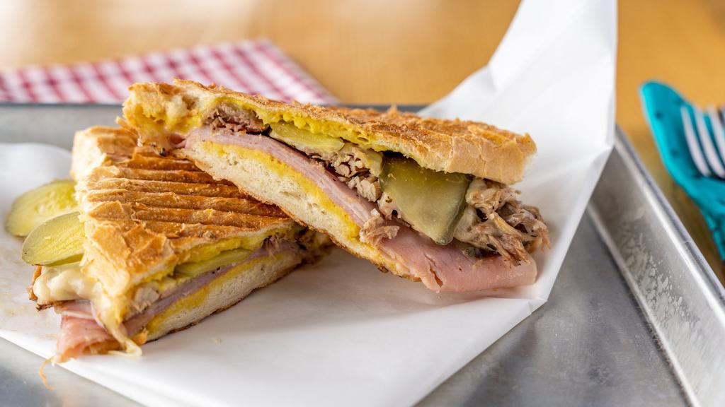 Cuban · PRESSED SANDWICH WITH HAM, MOJO PULLED PORK, PICKLES, SPICY MUSTARD, AND SWISS