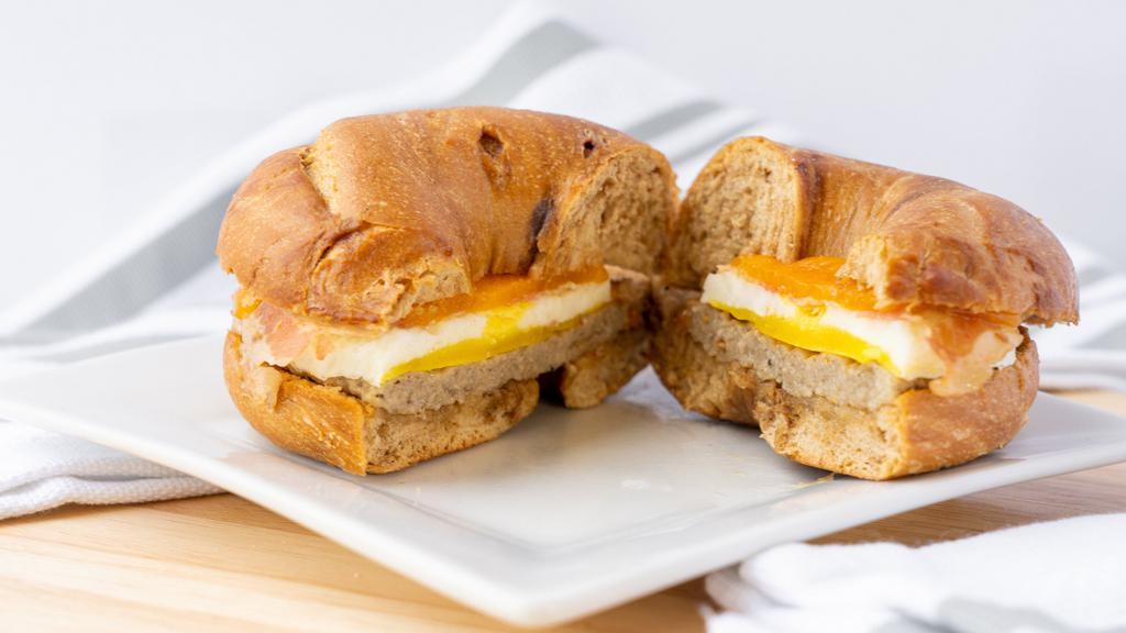 French Toast Ultimate Breakfast Sandwich · This Ultimate Breakfast Sandwich is complete with a farm-fresh egg, natural Tillamook cheese, a lean sausage patty, and Hormel bacon on a french toast bagel. Bagel comes heated unless otherwise indicated.