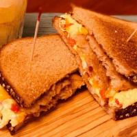 Breakfast Sandwiches · All sandwiches made with two large scrambled eggs and your choice of cheese.