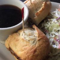 Deluxe Burger Dip · Served with Swiss and Grilled Onion French Bread and Au Jus.