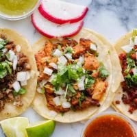 Tacos Family X 20 · 20 Corn Tortilla, Your choice of meat, cilantro onions and salsa.