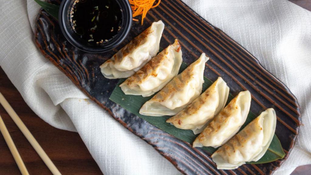 Vegetable Pot Stickers · Pan seared Asian dumplings served with a citrus soy dipping sauce.