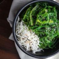 Seaweed Salad · Cooked seaweed and sesame seeds with a rice wine vinaigrette. Add Squid for an additional ch...