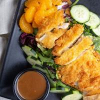 Fuji Chicken Salad · Grilled or panko crusted chicken, mandarin oranges, cucumbers, crispy wontons and sesame see...