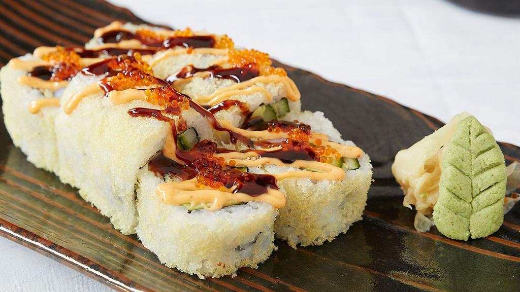 Cabana Roll · Tempura shrimp, avocado, cucumber, and sumo sauce, rolled in tempura crunchies and topped with tobiko and sweet sauce.
