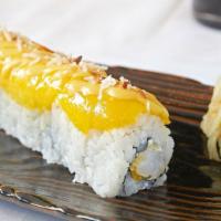 Mango Mamma Roll · Tempura shrimp and cream cheese topped with thin slices of fresh mango, shredded coconut and...