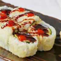 Firecracker Roll · Tuna, avocado, cucumbers and sumo sauce rolled in tempura crunchies topped with sriracha and...