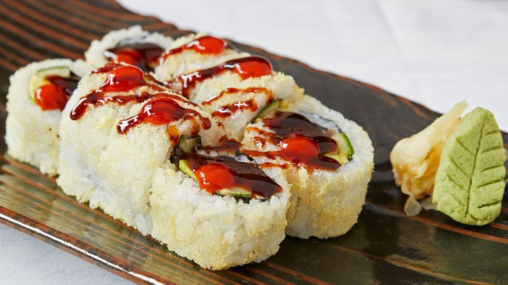 Firecracker Roll · Tuna, avocado, cucumbers and sumo sauce rolled in tempura crunchies topped with sriracha and sweet sauce.