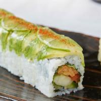 Frida Roll · Inari, red pepper, cucumber, green jalapeño and cilantro topped with avocado, lime, togarash...