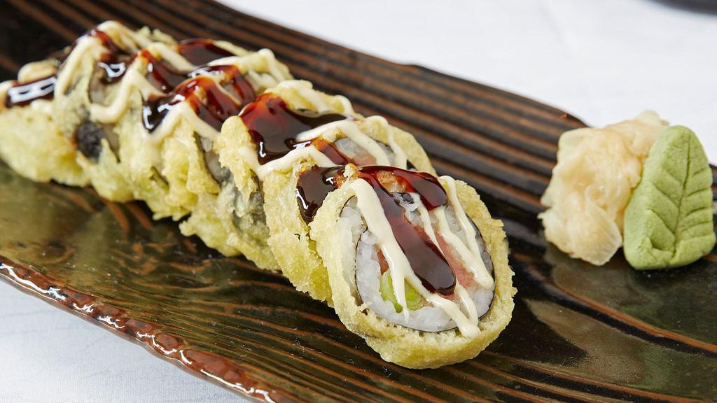 Funky Roll · Tuna, yellowtail or eel and green onions tempura dipped, topped with citrus wasabi and sweet sauce.