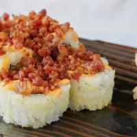 Bacon Crunch Roll · Tempura shrimp, green onion and avocado, rolled in bacon and tempura crunchies served with o...