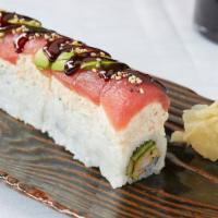 Marz Roll · Tempura shrimp, cucumbers and spicy sumo sauce, topped with crab salad, tuna sashimi, avocad...