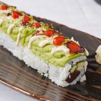 Rockstar Roll · Spicy tuna, cucumber and sprouts topped with avocado, lime, green onions and tempura crunchi...