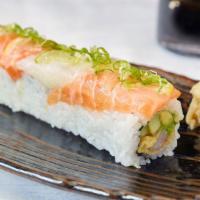 Cosmopolitan Roll · Tempura shrimp, cucumber and avocado topped with salmon and hirame sashimi, lemon, lime, gre...