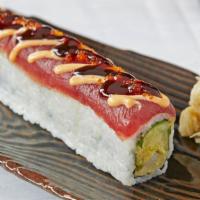 Playboy Roll · Tempura shrimp, avocado and cucumbers topped with tuna sashimi, sumo sauce, sweet sauce and ...