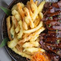 Teriyaki Beef Bowl · Grade a beef strips and our delicious teriyaki sauce served with tempura vegetables and stea...