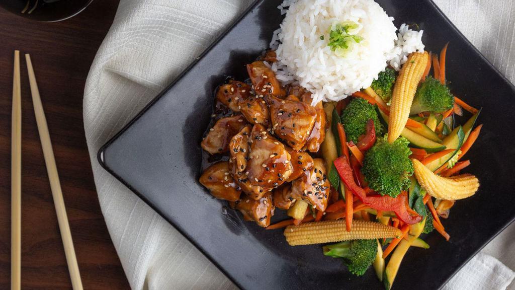 Teriyaki Tori · Bite size pieces of white chicken breast glazed with teriyaki sauce, served with steamed rice and your choice of stir fried or tempura veggies.