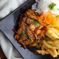 Happy Hawaiian · Tender white chicken breast marinated in pineapple juice, soy sauce and green chilies then g...