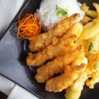 Seafood Tempura Dinner · Tempura dipped halibut, tempura salmon and panko crusted tiger prawns served with sweet pepp...