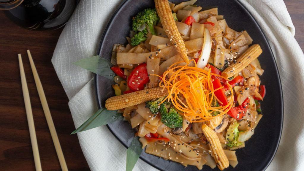 Siam Street Noodles · Spicy Asian flat noodles pan sautéed with Thai chilis, basil, garlic and seasonal veggies tofu or chicken.