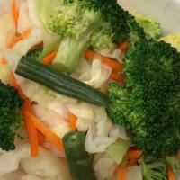 Steamed Vegetables · Broccoli, carrots and Napa cabbage.