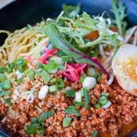 Tantan Men · Spicy ground pork, bean sprouts, spinach, scallions & soft boiled half egg in spicy miso bro...