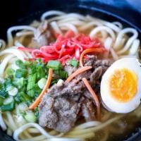 Niku Udon · Thick Japanese udon noodles, sautéed beef, scallions & soft boiled half egg in soy broth