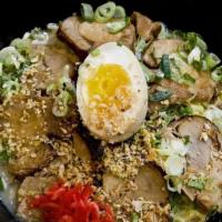 Chashu Men · Extra Chashu, bean sprouts, spinach, scallions, soft boiled hand egg in creamy pork broth ov...