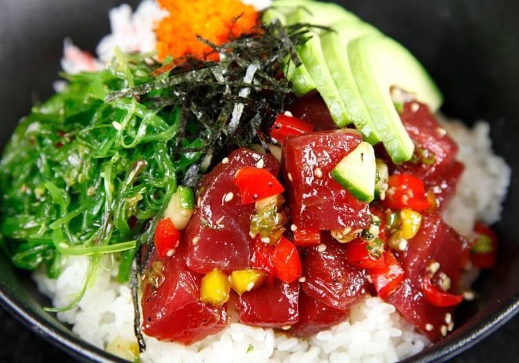 Poke Tuna Bowl · Poke tuna, seaweed salad, avocado, crab meat over rice with shoyu classic sauce
