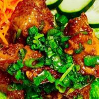 Chicken Wings (6 Pcs.) · Crispy chicken wings coated with a special mixed sriracha and curry sauce. Or coated with a ...