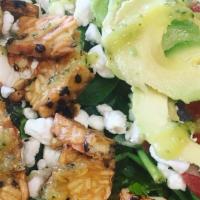 Avocado Tempeh Wrap · Tempeh, avocado, tomatoes, cucumbers, onions, romaine lettuce, spinach, goat cheese, and dri...