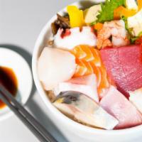 Chirashi (Lunch) · Assorted sashimi, Japanese pickles on sushi rice. Served with choice of miso soup.