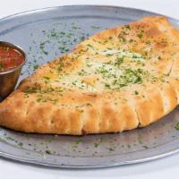 Calzone · Our scratch-made pizza dough, folded and filled with a custom blend of spices, ricotta, melt...