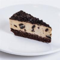 Cookies & Cream Mousse Cake · Chocolate cookie crumbles piled on top of rich, whipped cookies-and-cream mousse.